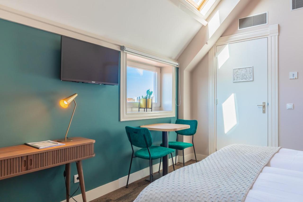 stadshotel rembrandt lijden kamer bureau